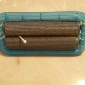 Under side of brush with Q-tip between brushes.