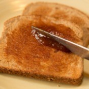Apple Butter being Spread on Toast