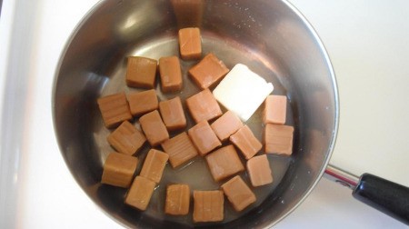 Caramels and butter in pan.