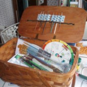 Picnic basket used to hold art supplies.