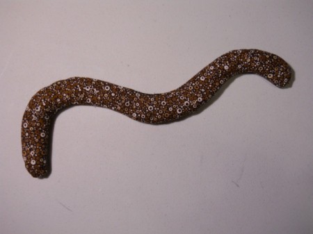 Finished bookworm weigh filled with sand.