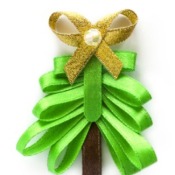 A Christmas tree made out of ribbon.