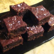 A plate of mini sea salt caramel brownies.