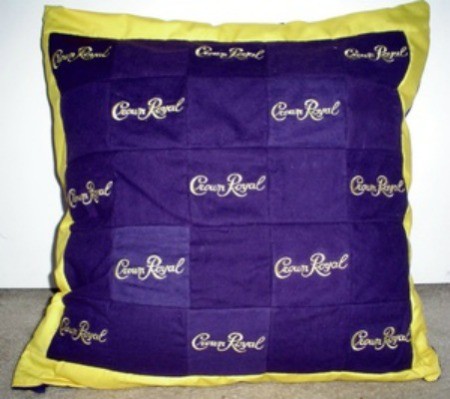 A pillow made from Crown Royal bags.