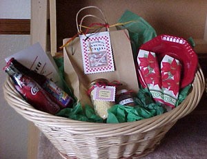 A gift basket with a theme of "Dinner and a Movie".