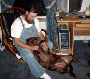chocolate lab and owner