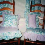Curtains, pillow, and chair cushions from vintage sheet.