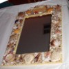 Framed mirror decortated with shells.