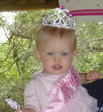 baby wearing a tiara