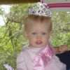 baby wearing a tiara