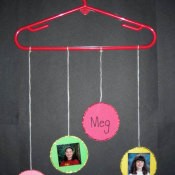 Clothes hanger with friends names and photos.