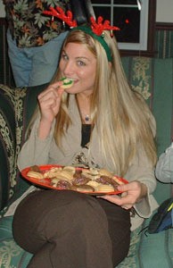 Young woman with plate of cookies
