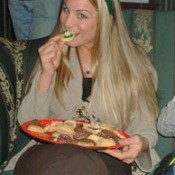 Young woman with plate of cookies