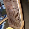 Broken cane back chair.