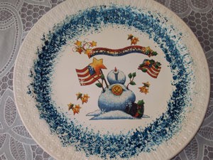 Plate decorated with a snowman transfer.