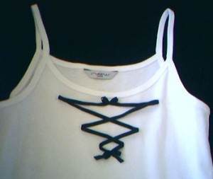 Faux ribbon lacing on tank top.