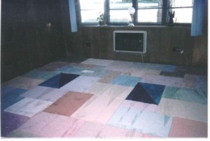 Floor carpeted with samples.