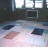 Floor carpeted with samples.