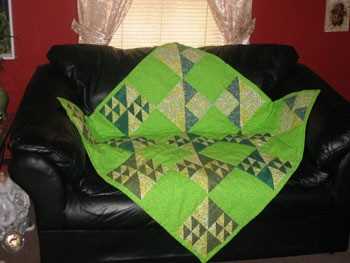 lime green flying geese baby quilt