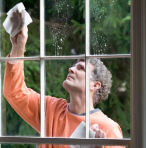 A man washing windows.