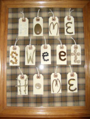 A frame that says "Home Sweet Home" on tags.