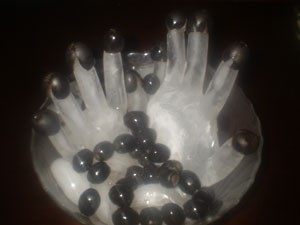 olives on frozen hand forms