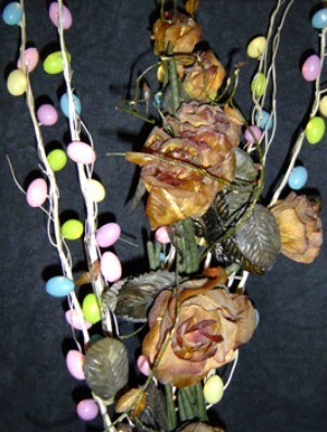 Mini lites in floral arrangement.