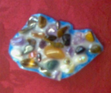 Stone and bead brooch.