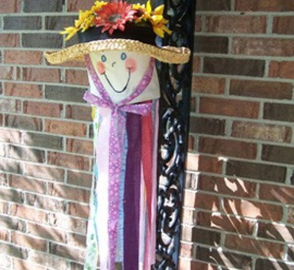 windsock hanging against brick wall