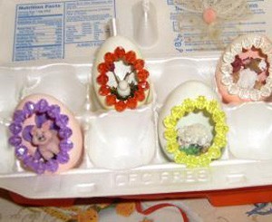 Several finished eggs in carton.