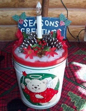 A decorative lighted welcome tin made from a recycled popcorn tin.