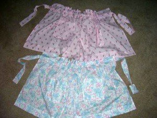 Pink and blue aprons.