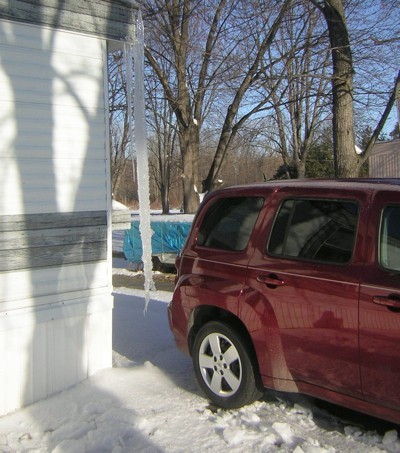 Long Icicle hanging from the gutter.