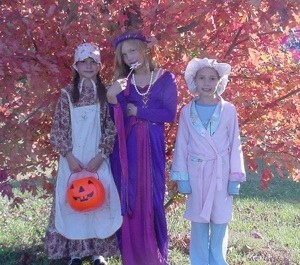 Three children in costume.