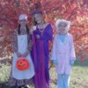 Three children in costume.