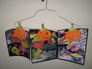kids artwork on clothing hanger