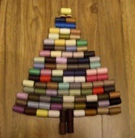 Making a Thread Spool Christmas Tree - small spools of thread used to make a tree shape