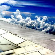 clouds above airplane wing