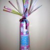 Gift wrapped cylinder.