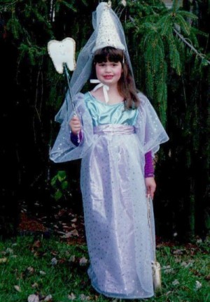 young girl dressed as tooth fairy