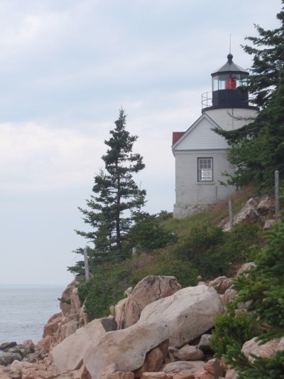 Lighthouse on cliff.