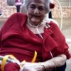 Elderly woman in red