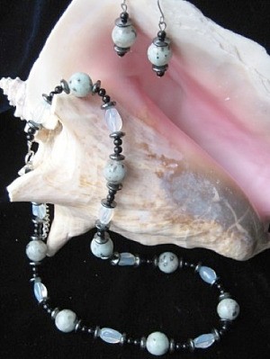 Sea shell with jewelry.
