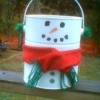 paint can decorated as a snowman