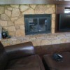 Rock Fireplace with a recliner in front