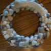 plaster covered Styrofoam and shell wreath