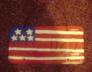 car license plate painted as stylized American flag