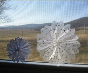 paper snowflakes on window