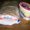 ice-cream container in cat food bag