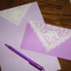 Lavender stationery with doily added to paper and envelope.